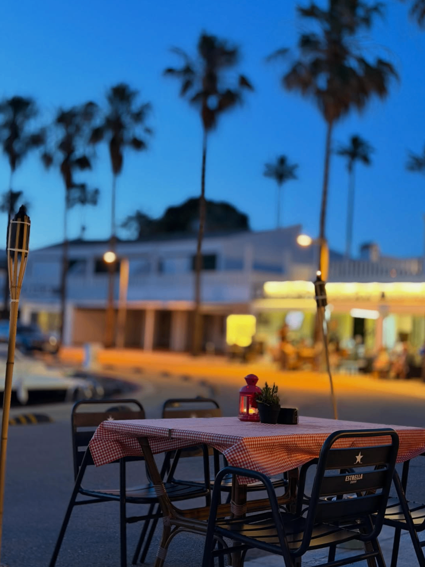 Why Not terrace at sunset in Cala'n Bosch, Menorca